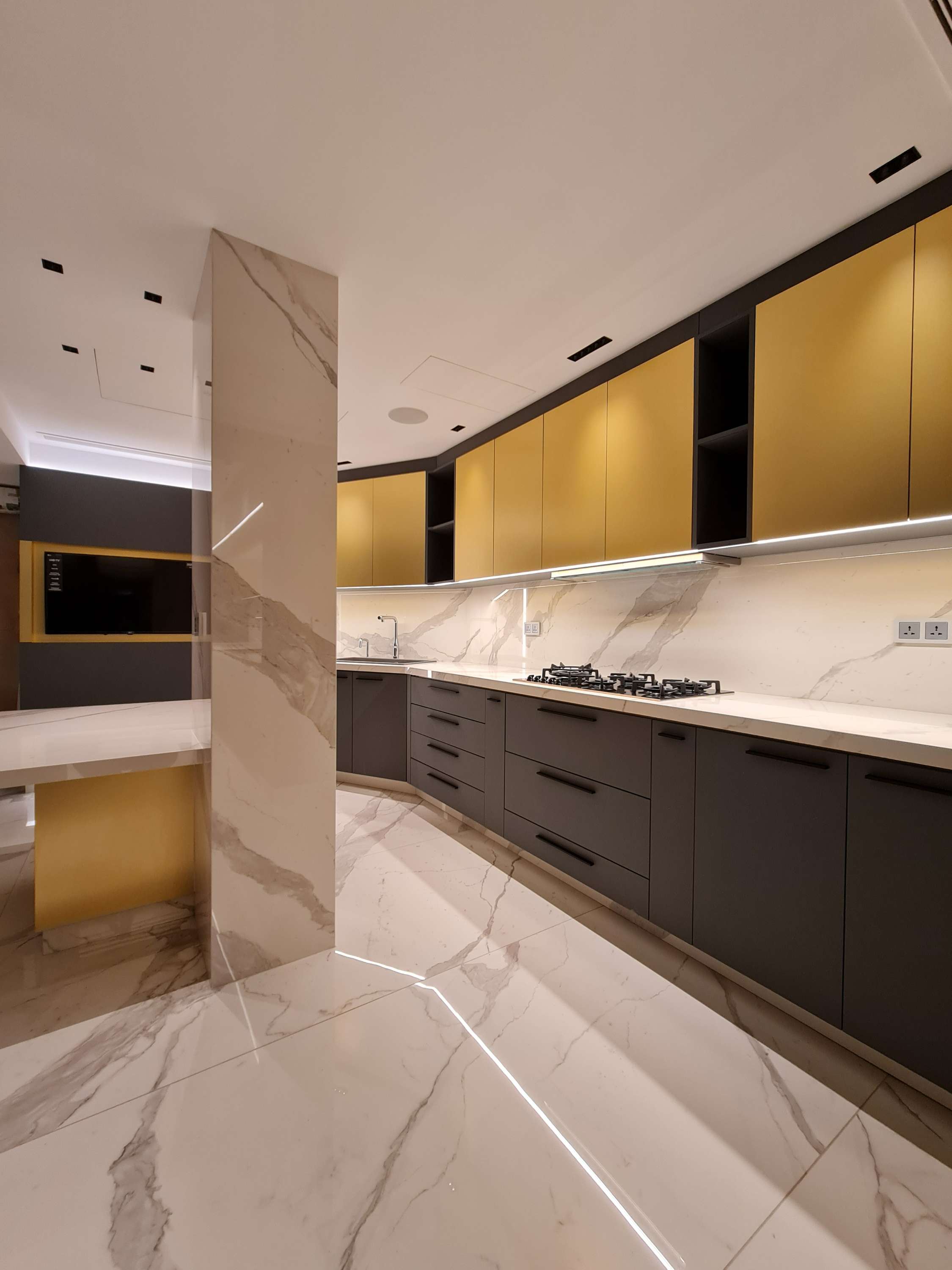 Bold kitchen design featuring vibrant colors and open shelving by La Fabriqua