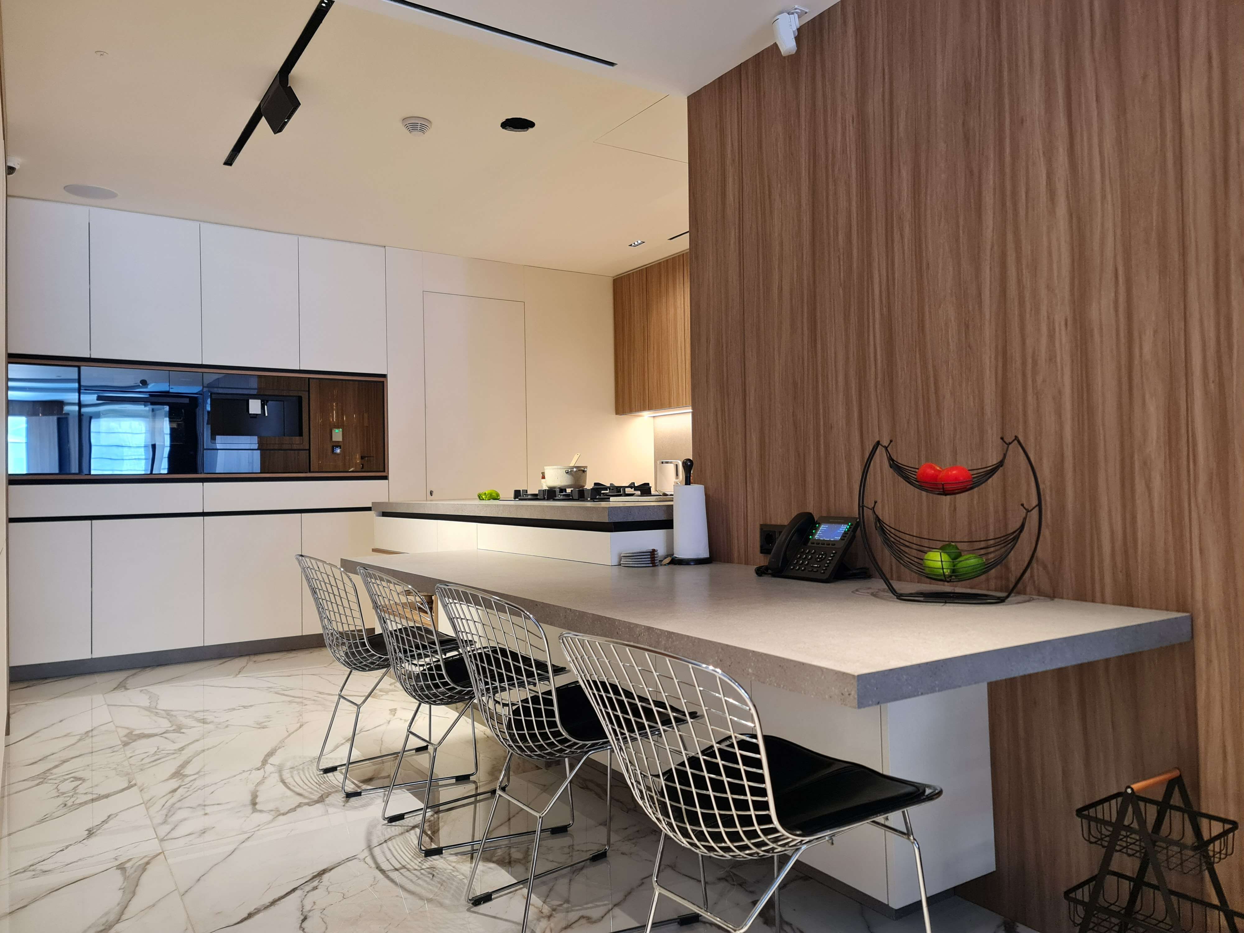 Chic kitchen with minimalist design and state-of-the-art features by La Fabriqua